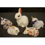 A Royal Crown Derby paperweight, Snowy Rabbit, gold stopper; others, Sitting Piglet, Sleeping