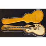 Musical Instrument - a Custom CSL electric guitar, cased en suite, 20th century