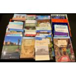 A collection of National Trust and other souvenir guide books, including Canterbury Cathedral,