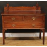 A Chippendale Revival mahogany chest, shaped superstructure, oversailing top above two short and one
