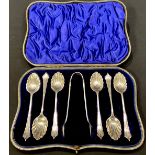 A set of six Victorian silver teaspoons and sugar bows en suite, cased, Birmingham 1899, 119g
