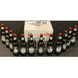 Derby County Football Club - a box of twelve Marston Pedigree beer bottles with contents,