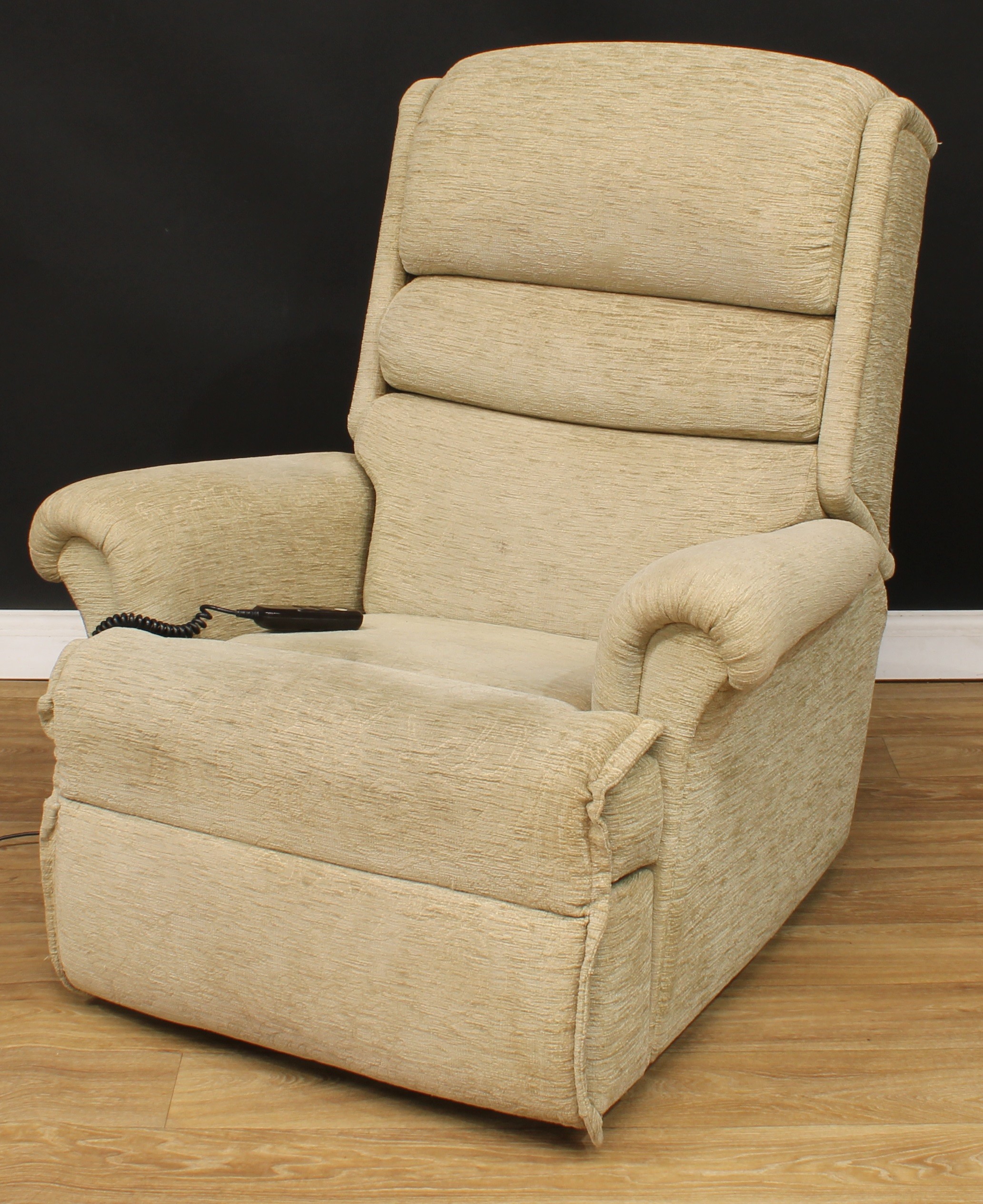 A Sherborne electric recliner armchair, 108cm high, 98cm wide, the seat 54cm wide and 51cm deep