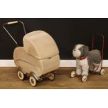 Toys and Juvenalia - an 'Art Deco' style wicker type pram and a dog on wheels (2)