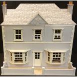 Toys & Juvenalia - a contemporary wooden doll’s house, 71cm high, 75cm wide, 51cm deep