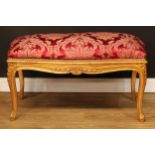 A contemporary George III style giltwood window seat, in the French Hepplewhite taste, 56cm high,