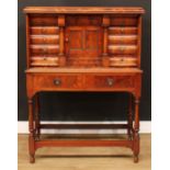 A Biedermeier flame mahogany architectural collector’s cabinet, rectangular top with convex-