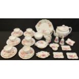 A Royal Crown Derby Posie pattern tea set for six comprising teapot, six teacups, saucers and tea