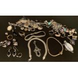 Jewellery - a collection of silver bracelets, pendants, brooches, etc