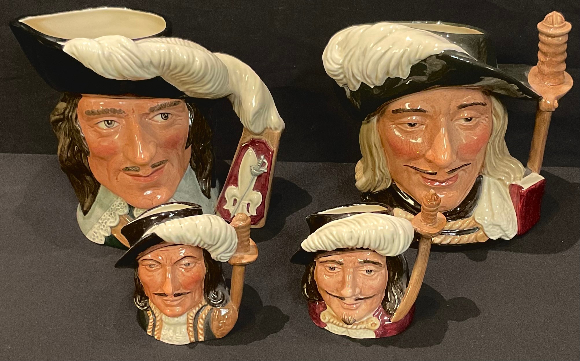 A Royal Doulton character jug, D'artagnan, D6691; others, Aramis, D6441; Porthos, D6453; Athos,