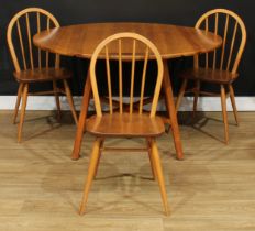 An Ercol 663 Pine Line drop-leaf dining table, 72cm high, 64cm opening to 124cm long, 113.5cm