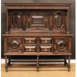 A Jacobean style oak sideboard, 169.5cm high, 174cm wide, 51cm deep