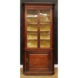 A George III oak floor-standing corner display cabinet, 223cm high, 106cm wide, 49cm deep, early