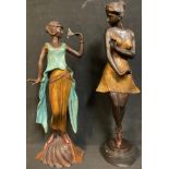 A dark patinated bronze figure, Art Deco style Dancing Girl, 43.5cm, 20th century; another similar