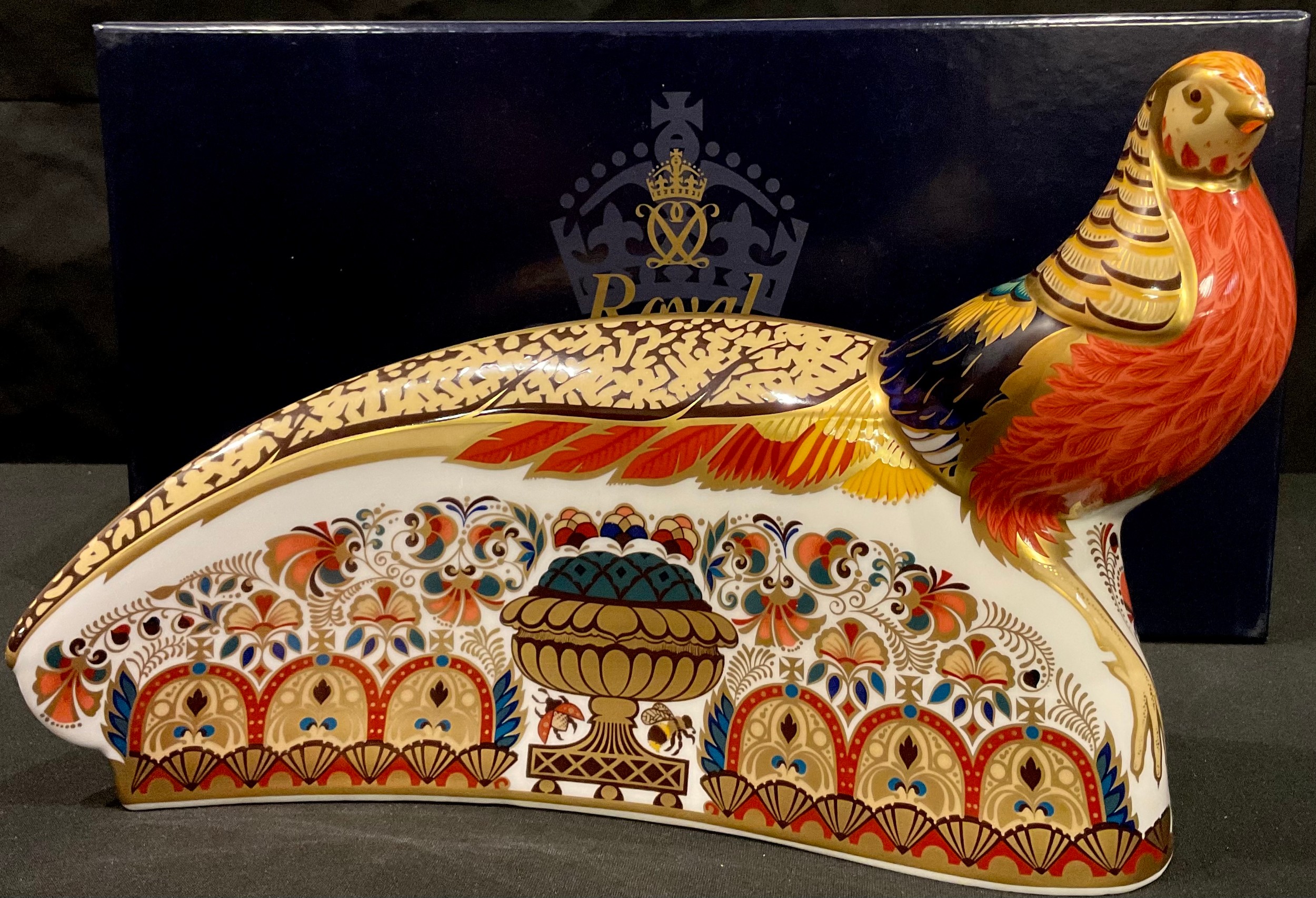 A Royal Crown Derby paperweight, The Golden Pheasant, gold stopper, printed mark, boxed