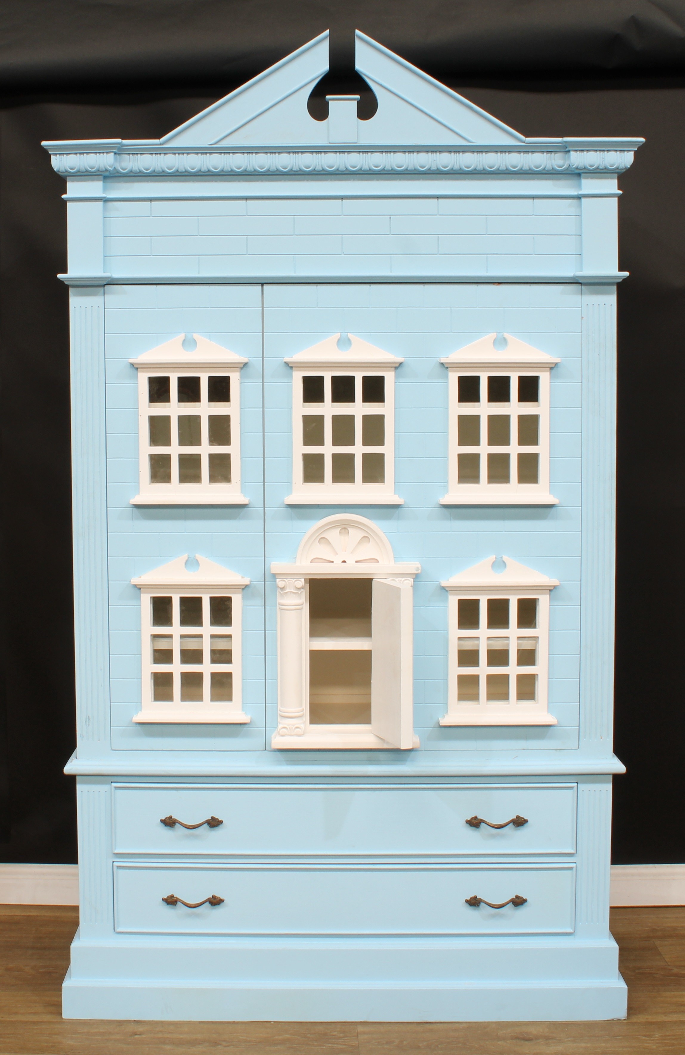 A contemporary wardrobe or linen press, as a large doll’s house, broken-arch pediment above an egg- - Image 2 of 3