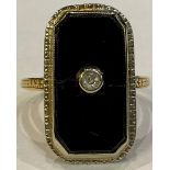 An 18k gold mourning type jet and diamond ring, size Q, 5.5g, late 19th/early 20th century