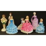 A Royal Doulton figure, Day Dreams, HN1731; others, A Child From Williamsburg, Tracy and Amelia; a