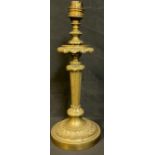 An early 20th century ormolu table lamp