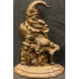 A cast iron novelty door stop, as Mr Punch