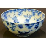 A Chinese blue and white bowl, decorated with a procession from the Hundred Boys, centred by a