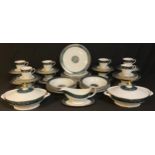 A Royal Doulton Carlyle pattern dinner service for twelve comprising vegetable dishes, sauce boat