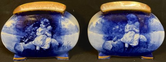 A pair of Royal Doulton Children pattern flattened ovoid vases, transfer printed, number 1023, 9.5cm