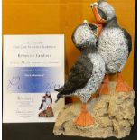 Rebecca Lardner, a cold cast porcelain sculptural puffin group, Rocky Romance, limited edition 427/