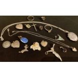 Jewellery - an oval silver locket on chain; four heart shaped lockets; six pendants; etc