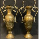 A pair of Anglo-Indian brass two handled baluster vases, in the Bidri manner, early 20th century