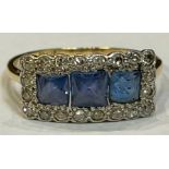 An 18ct gold three stone topaz and diamond ring, size S, marked 18ct, early 20th century, 2.9g