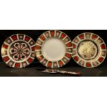 A pair of Royal Crown Derby 1128 Imari pattern dessert plates, 21.5cm diameter, second quality;