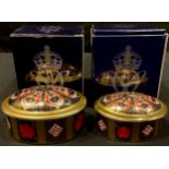 A Royal Crown Derby oval trinket pot and cover, solid gold band, first quality, 10cm wide, boxed;