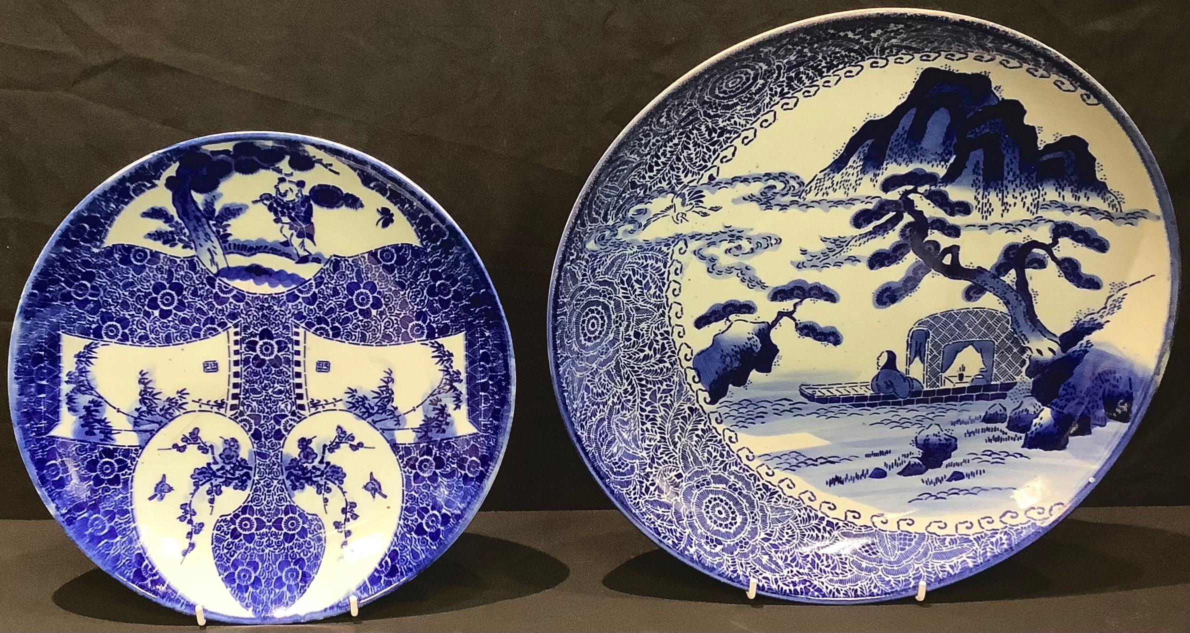 An early 20th century Japanese blue and white charger, 29cm diameter; another similar, 35.5cm