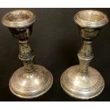 A pair of Elizabeth II silver candlesticks, Birmingham 1963.