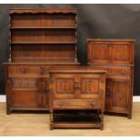 A Jaycee oak dresser, 174cm high, 122cm wide, 43cm deep; a similar side cabinet, 85cm high, 79cm