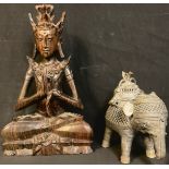 A Benin type elephant incense jar, 16cm; an Indonesian carved hardwood deity figure, 28cm (2)
