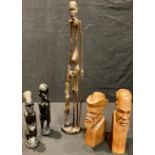 Tribal Art - an African carved hardwood bust of a bearded gentleman wearing a hat, 27.5cm high;