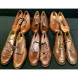 A mid-20th century collection of gentlemen's' utility brown leather shoes, original shop stock, some