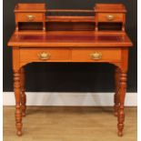 A writing desk, shaped superstructure with two small drawers, rectangular top with inset tooled