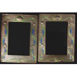 A pair of contemporary enamelled Art Nouveau style silver photograph frames, impressed sterling,
