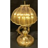 An adjustable brass desk lamp, shell shaped shade, 34cm