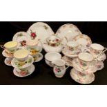 A Paragon Harry Wheatcroft World Famous Roses pattern tea set for six; a Staffordshire floral