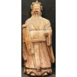 A Chinese carved figure, of an immortal, 33cm high