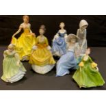 A Royal Doulton figure, Summer HN5322; others, Hilary HN2335; Coralie HN2307; two smaller; two