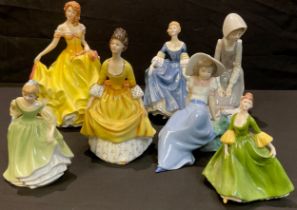 A Royal Doulton figure, Summer HN5322; others, Hilary HN2335; Coralie HN2307; two smaller; two