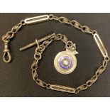 A George V silver fancy link Albert chain, Birmingham 1924; silver and enamel fob, Birmingham 1929