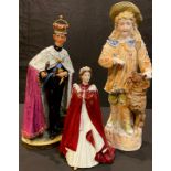 A late 19th century German porcelain figure, Faithful Companion, 39cm; an Italian figure by Merli,