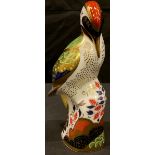 A Royal Crown Derby paperweight, Green Woodpecker, gold stopper, 17.5cm, printed marks in red
