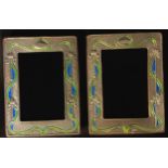 A pair of contemporary enamelled Art Nouveau style silver photograph frames, impressed sterling,